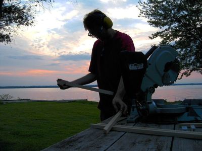 Kyle Clements cutting pine with a mitre saw